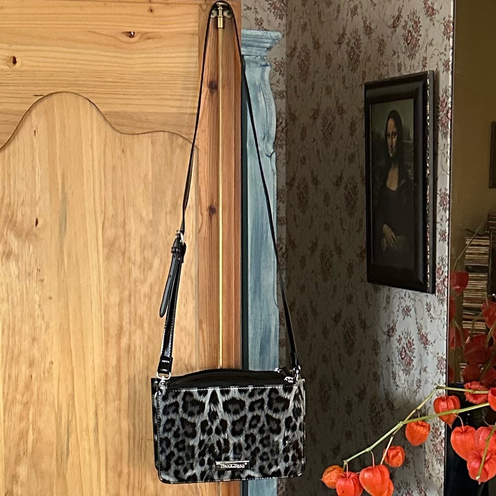 Frank Lyman Leopard Print and Bag, 9”wide, 4”deep, 6”high, patent finish, $85